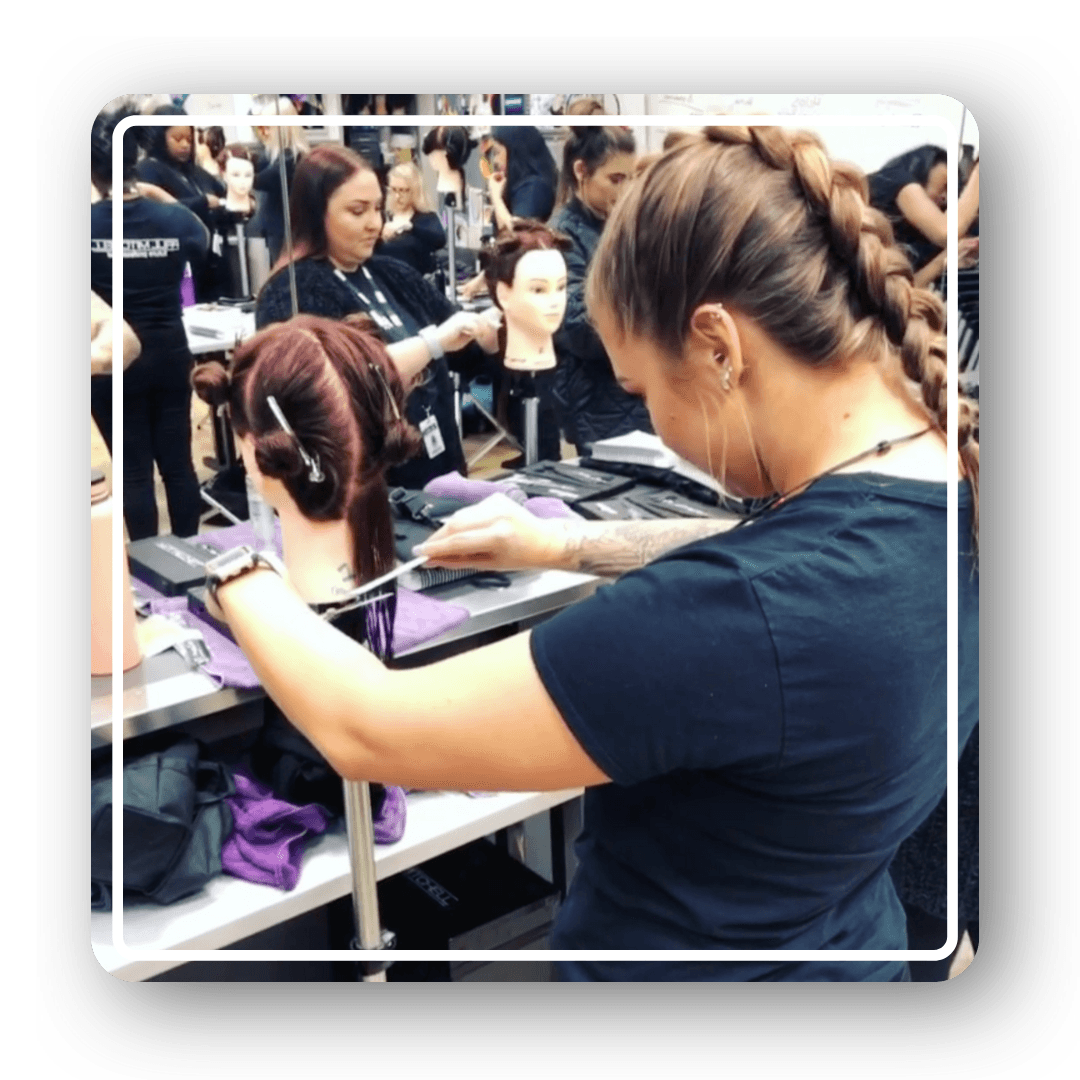 Baylea styling a client's hair