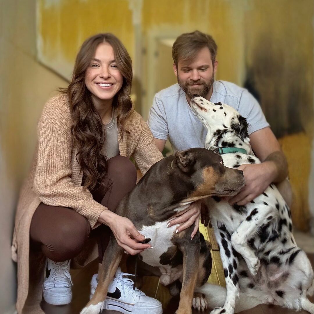 Baylea with her husband Ryan and their two dogs
